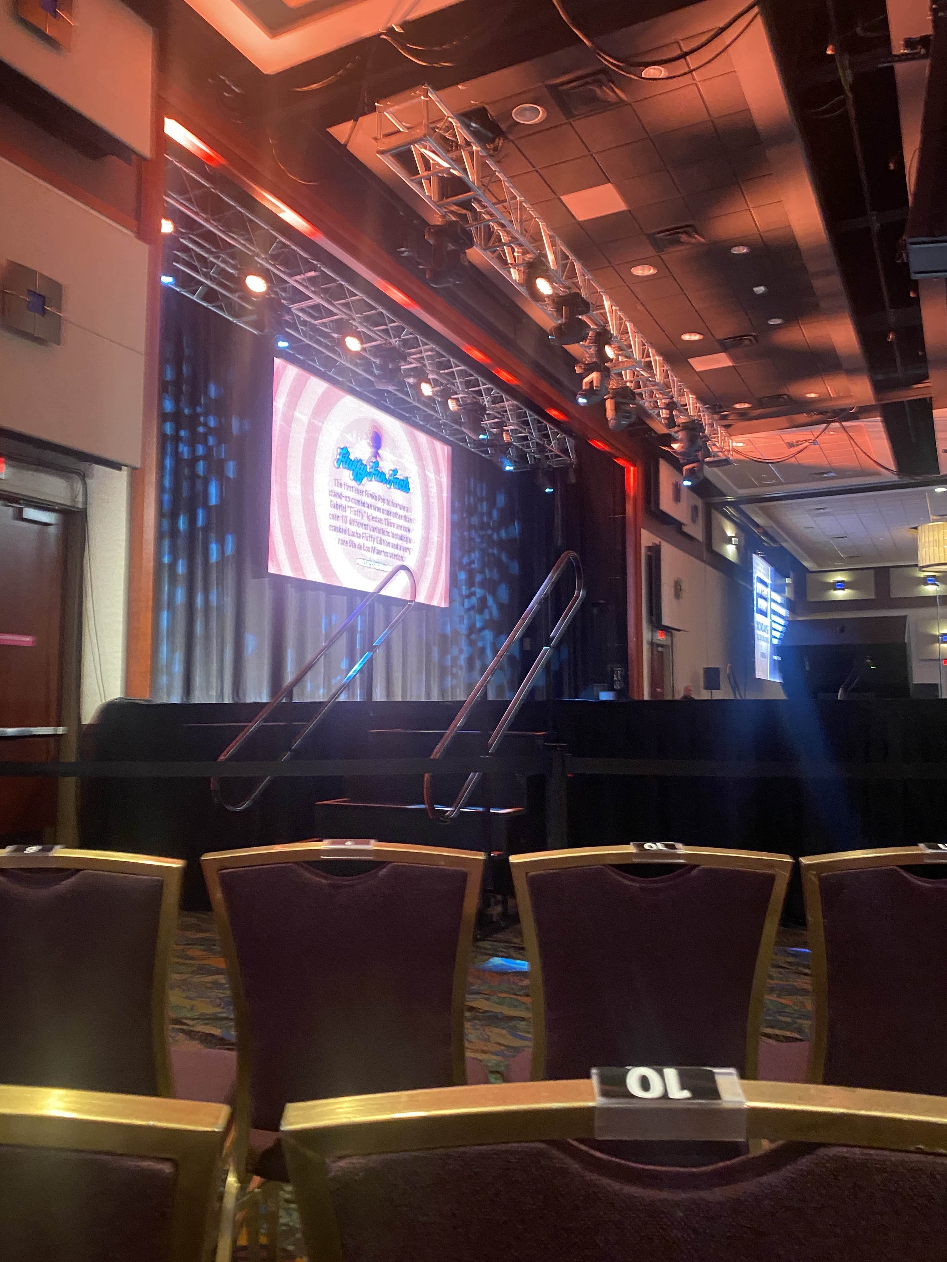 an image of a stage and seats